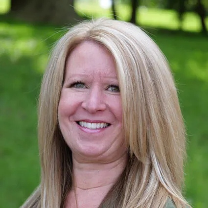 Meet The Team 1 Heather, active-therapy specialist, assisting a patient during rehab